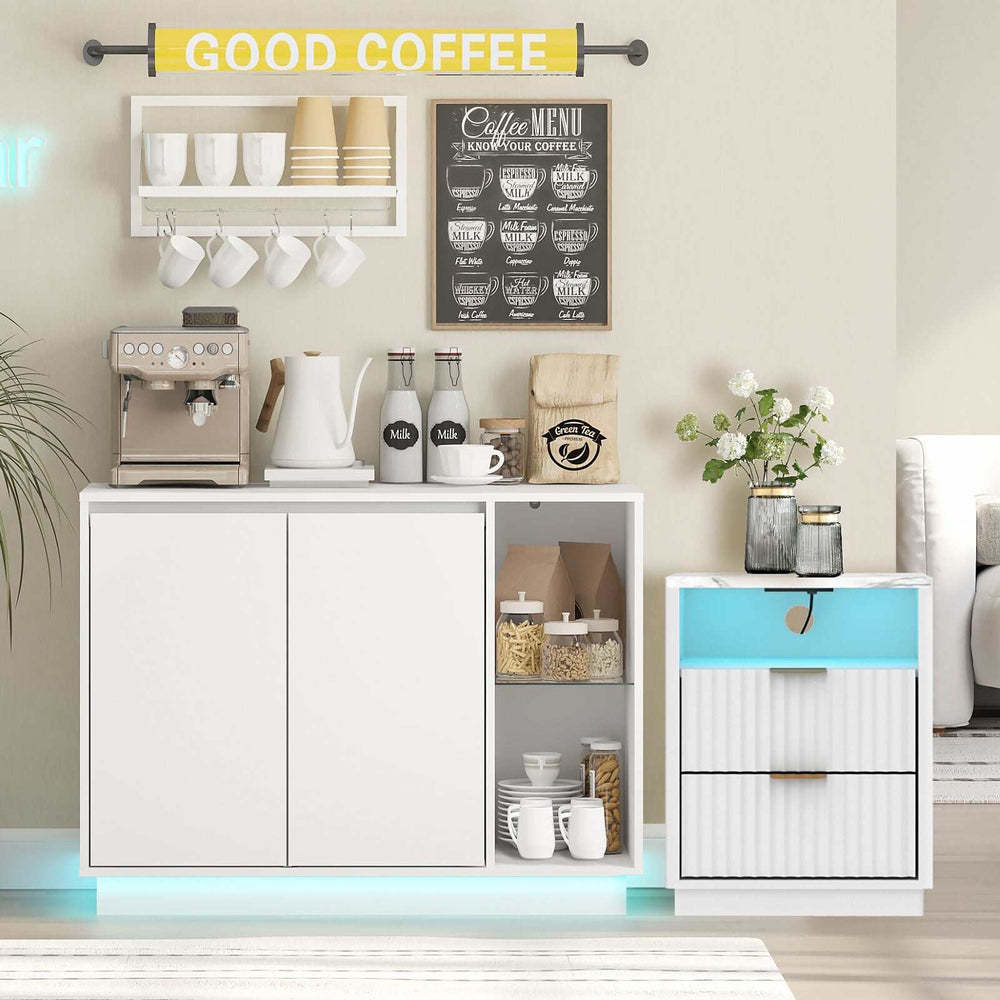 White sideboard buffet and LED-lit side table set with charging station in modern decor.