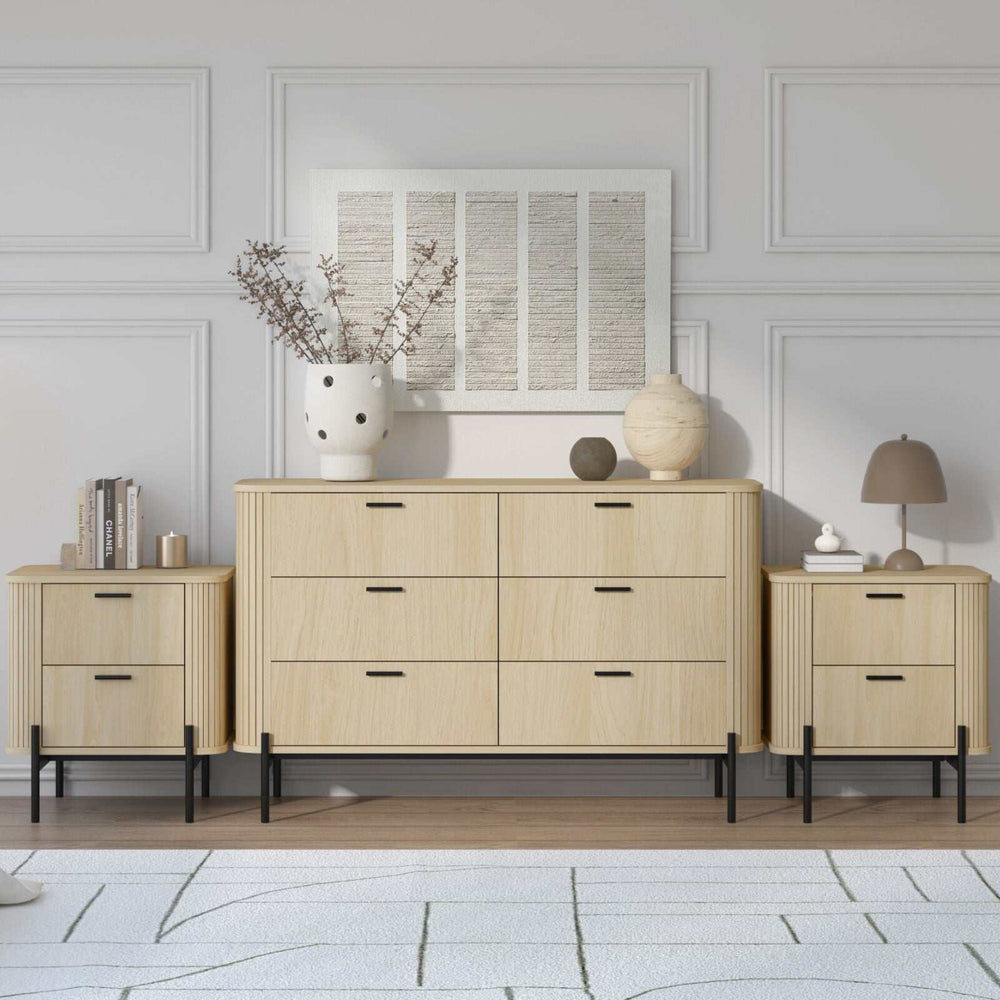 Fluted 6 drawer chest of drawers dresser with 2 bedside tables in stylish modern bedroom setup.
