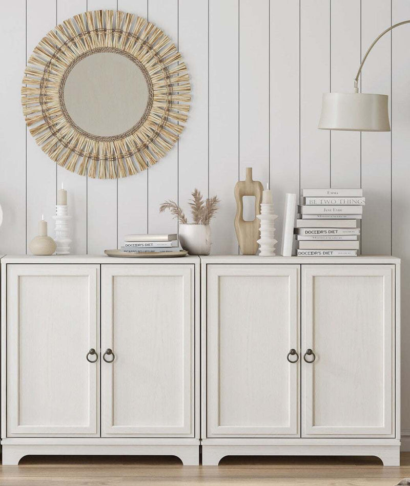 Stylish Sylvania off-white compact sideboard buffet duo set with bronze handles and paneled doors in a modern living room setting