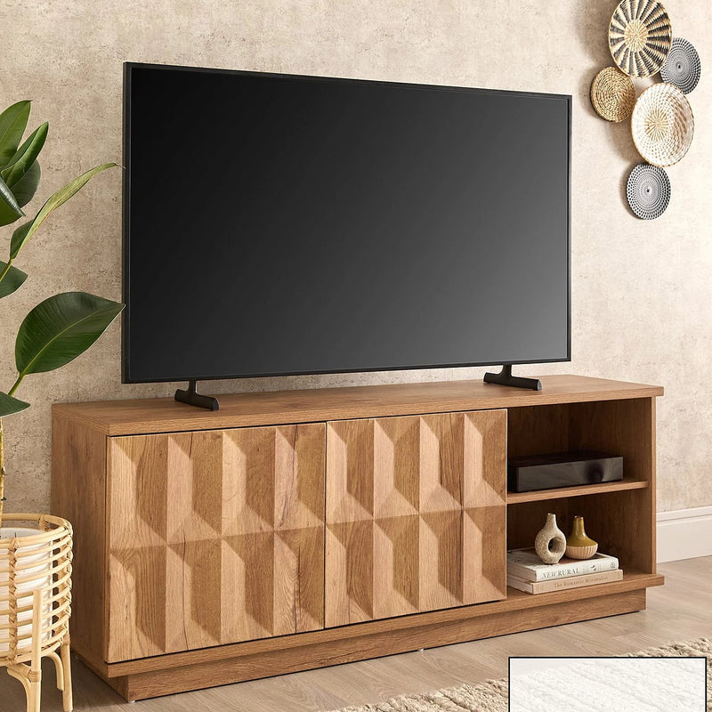 Wooden TV stand with a television on it in a room setting.