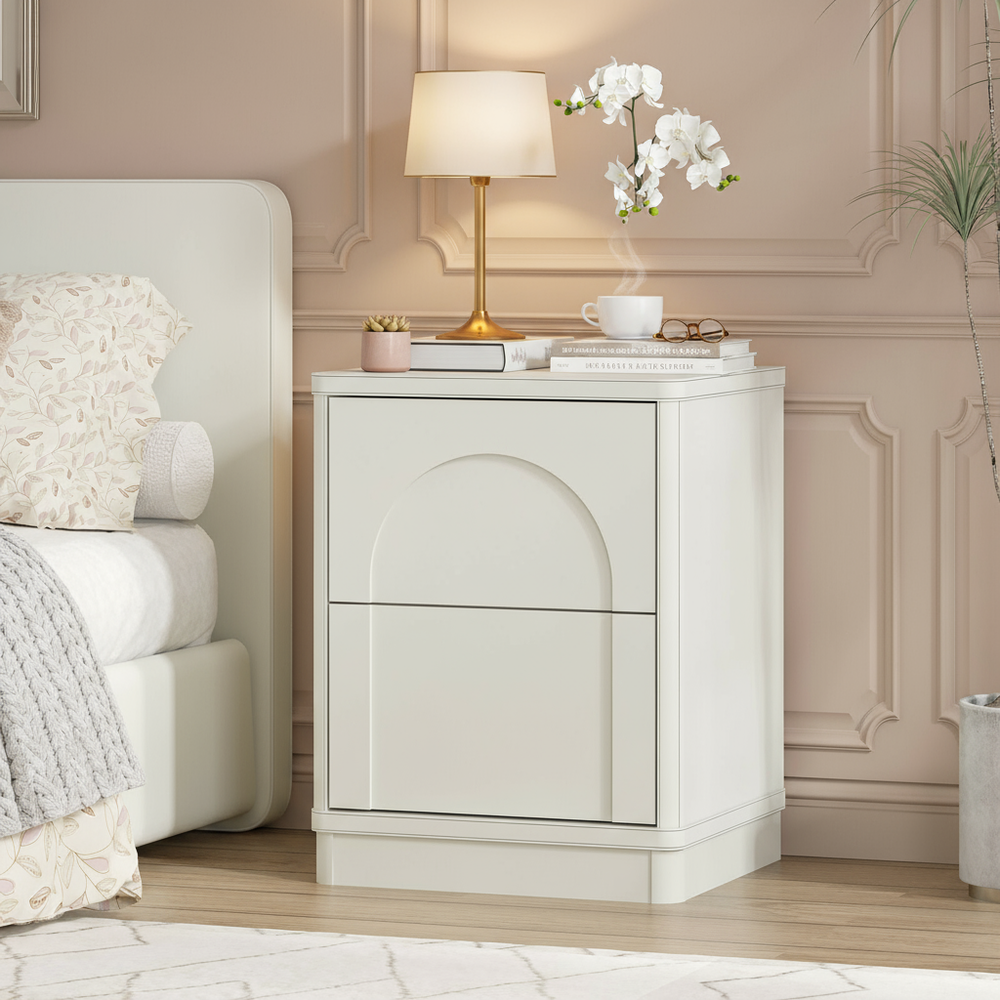 Cozy bedroom lifestyle image with white nightstand
