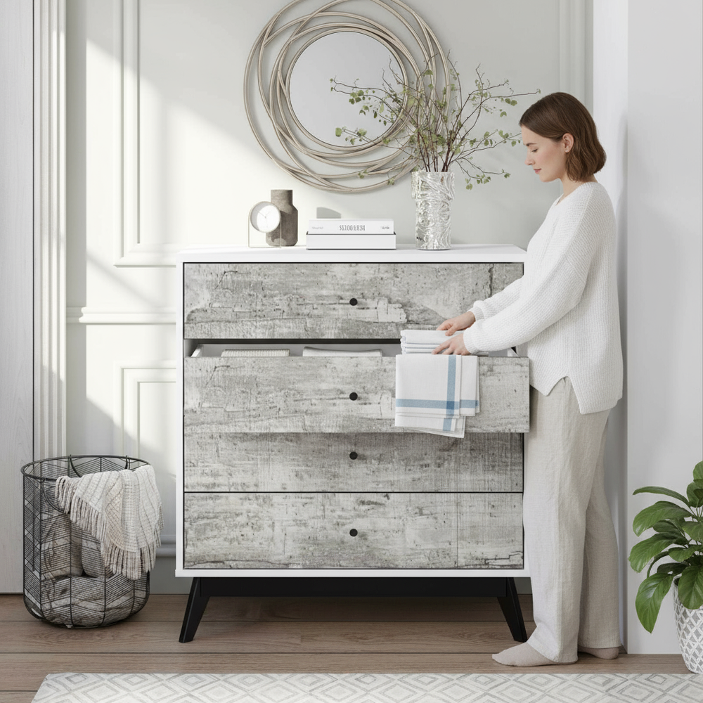 Entryway with person and open drawer on chest