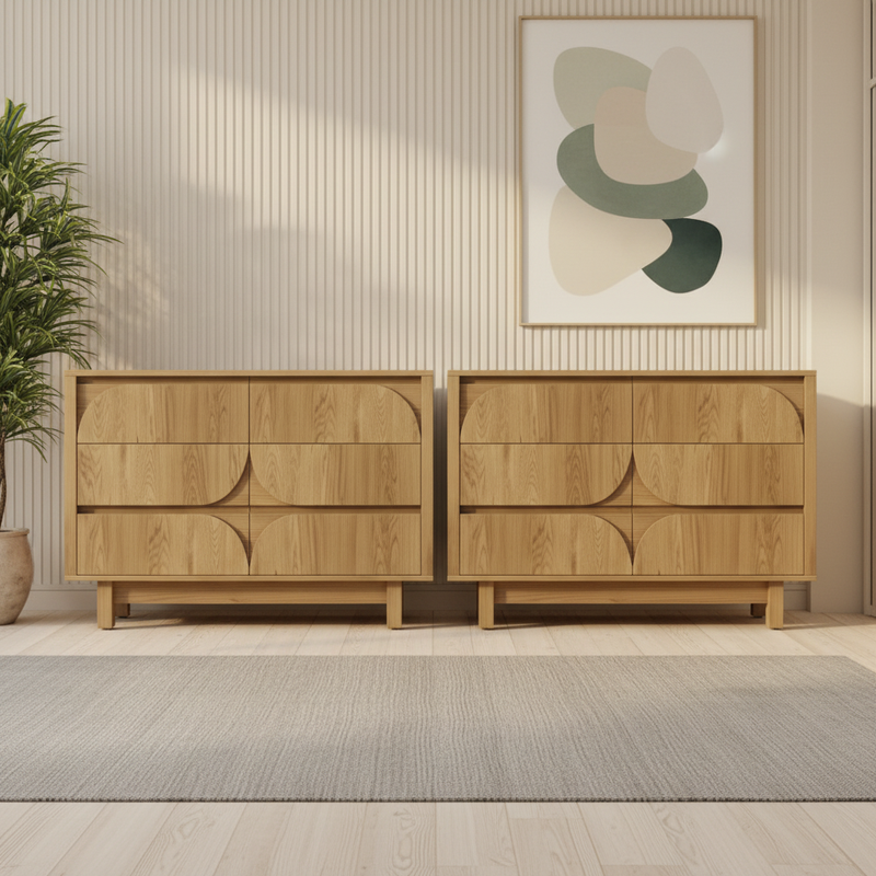 Front-on lifestyle shot of oak chest of drawers with interior background