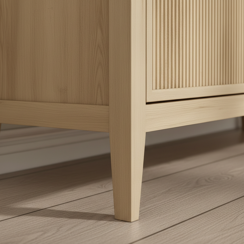 Low angle detail of tapered wooden legs and base construction