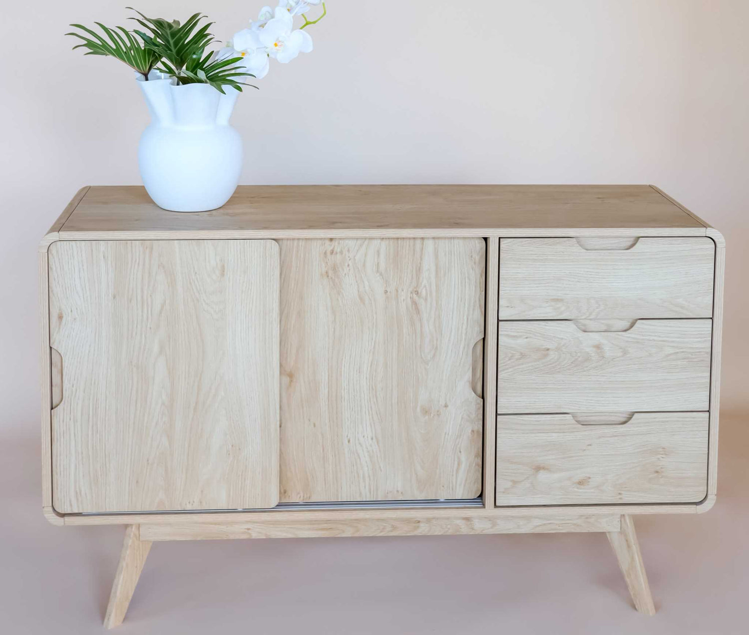 Oslo Sliding Door Buffet Sideboard with natural wooden finish, featuring two sliding doors and three drawers for ample storage.