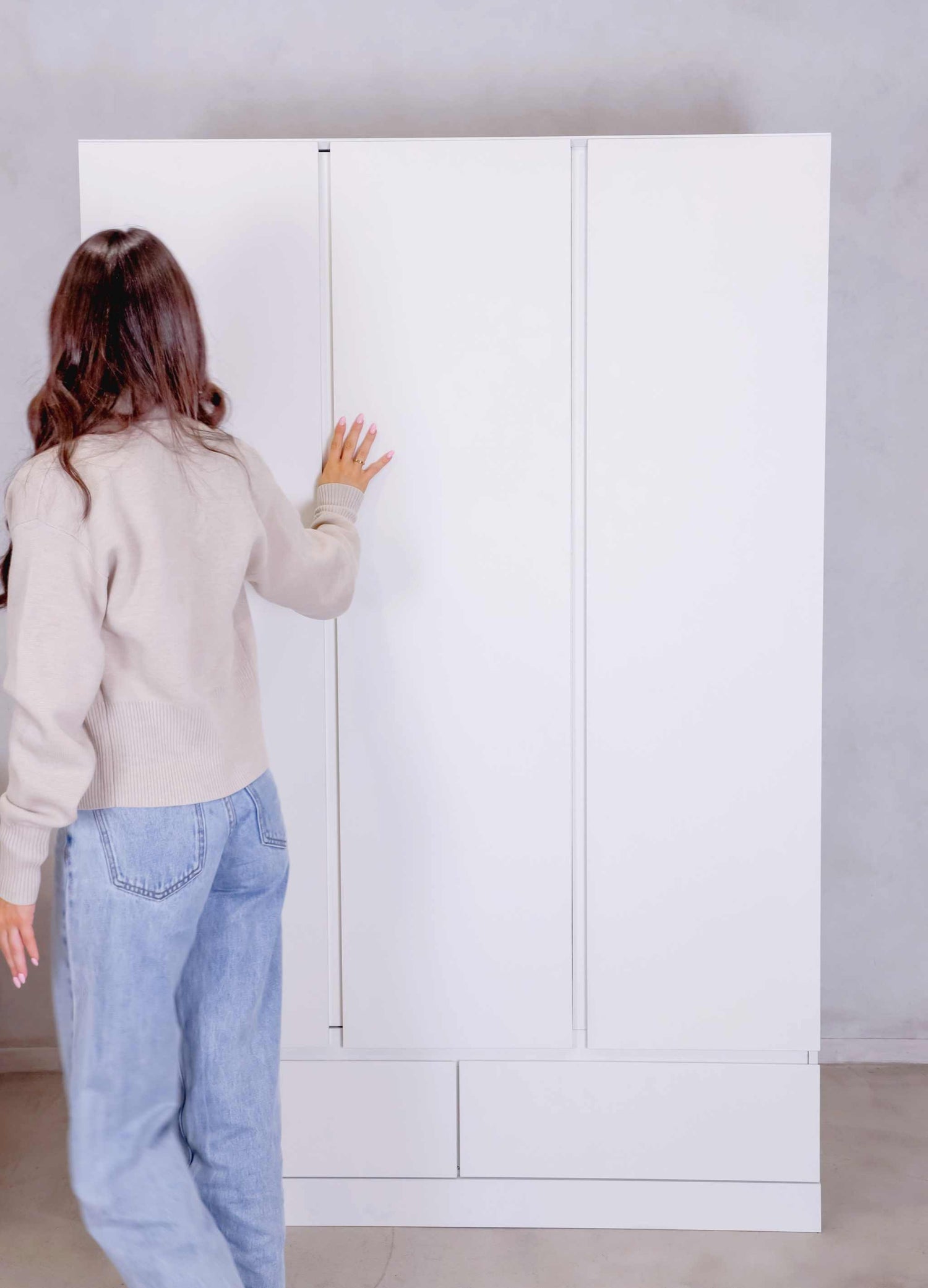 White MerryLuk Triple Door Wardrobe Closet with two drawers and ample storage compartments in a modern design.