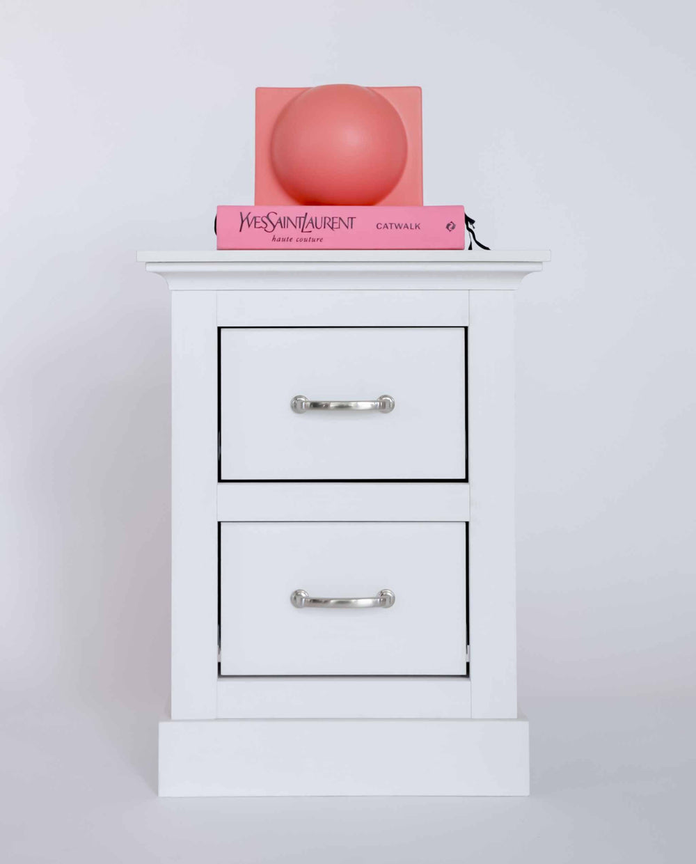 Ashford White 2-Drawer Bedside Table with contemporary steel hardware and elegant design.