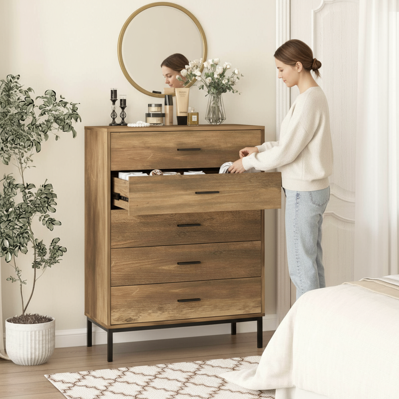 Wide bedroom shot with open drawer and person